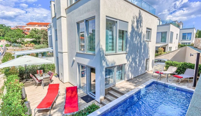 Villa Malinska - three bedroom villa close to beaches with a heated pool by MyWaycation