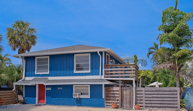 Villa near the beach with a spacious yard, kitchens, & washer/dryer