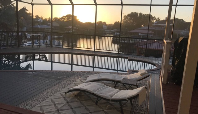 Villa Oasis, w/Heated & Covered Pool, Pool Table, Boat Dock, Gym and much more.