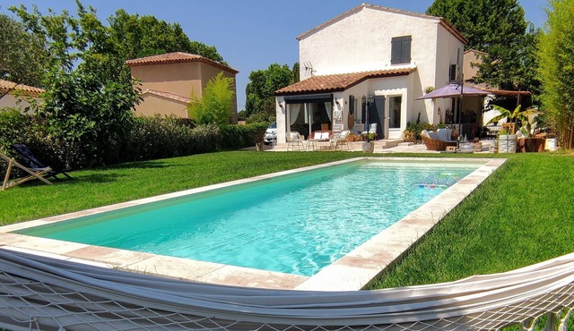 Villa on landscaped grounds with large swimming pool
