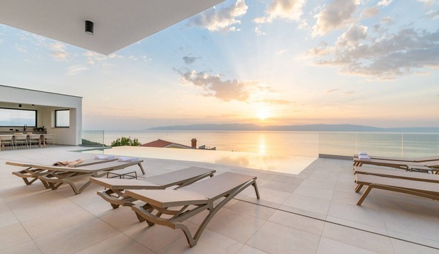 Villa rOvni with a stunning sea view and heated pool