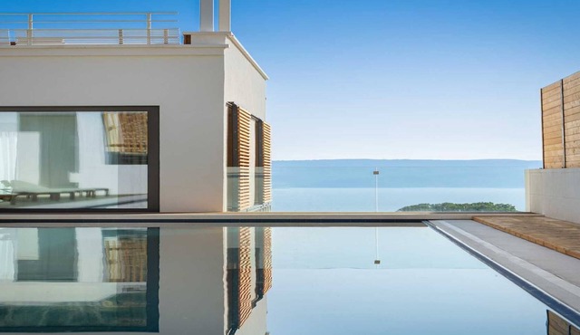 Villa Senzea - modern villa with heated pool, gym, sauna, jacuzzi and sea views by MyWaycation
