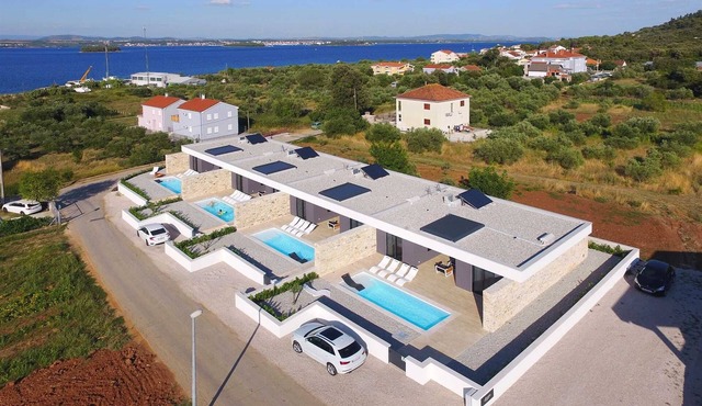 Villa Summer Bloom - sister villas each with a pool, 100m from the beach by MyWaycation