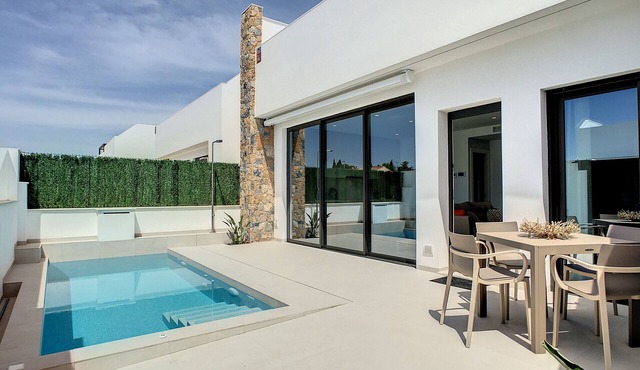 Villa with private roof terrace, patio with pool