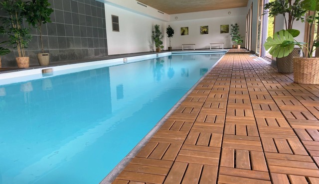Villa with a sauna, a fitness room, and an indoor heated swimming pool