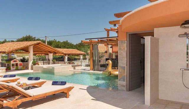 Villa with children's playground in Skradin