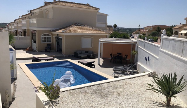 Villa with private pool and a large enclosed sun terrace.