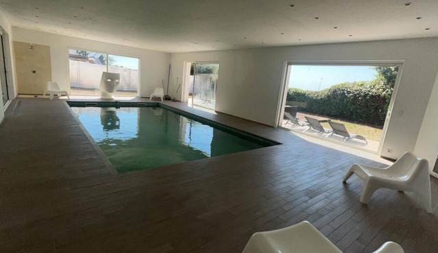 Villa with heated indoor pool and janitor