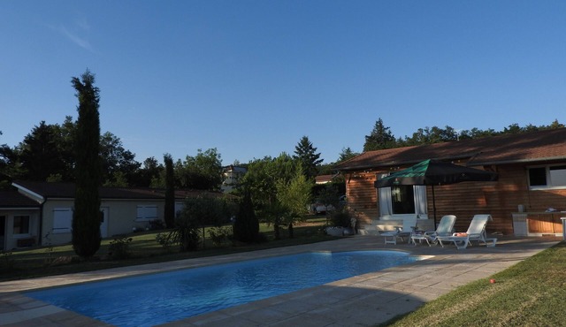 Villa with pool and open view, located towards Lyon .