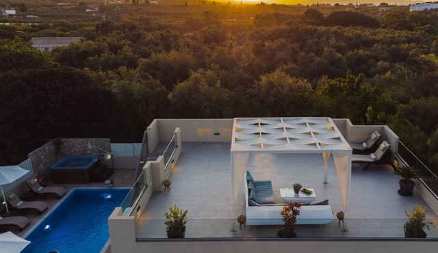 Villa with private pool, water massage pool and sea view roof garden