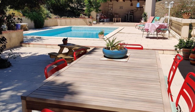 Villa with swimming pool among the cork oaks.