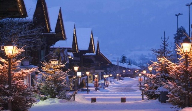 Village Gsteig Bei Gstaad and high mountains.Winter Wonderlandn