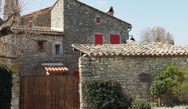Village house, in local stone - in a listed village, quiet with courtyard.