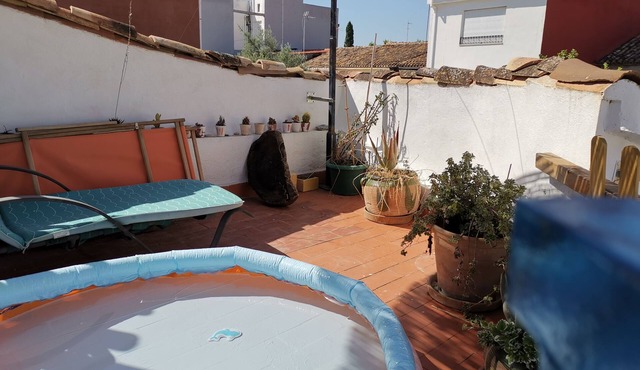 Village house with large terrace.