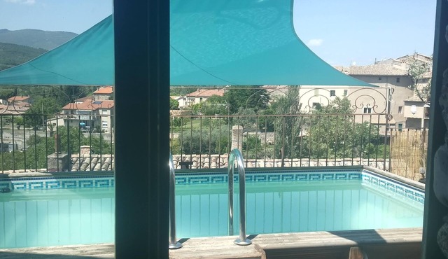 Village house with swimming pool and very large terrace, 10 mn south of Sisteron.