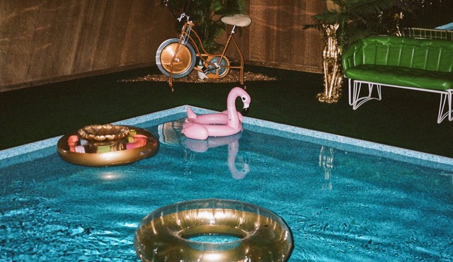 Vintage kitsch 70s/80s themed house with indoor pool and backyard creek