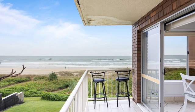 Wake to Waves in Spacious 3-Bed Beachfront Unit