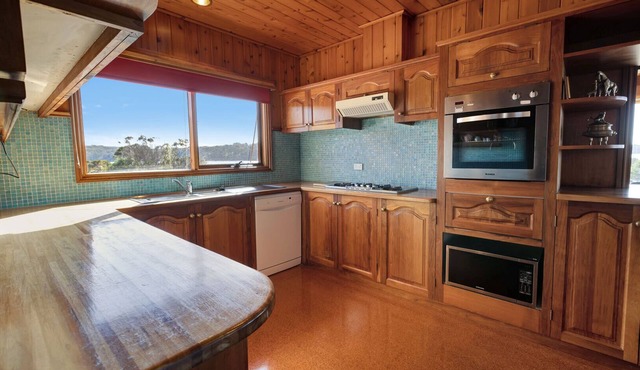 Wake up to panoramic views of the lake from the comfort of your cozy retreat