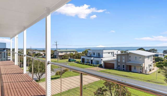 Wake up to panoramic ocean views every day in this beautifully designed coastal haven, where comfort