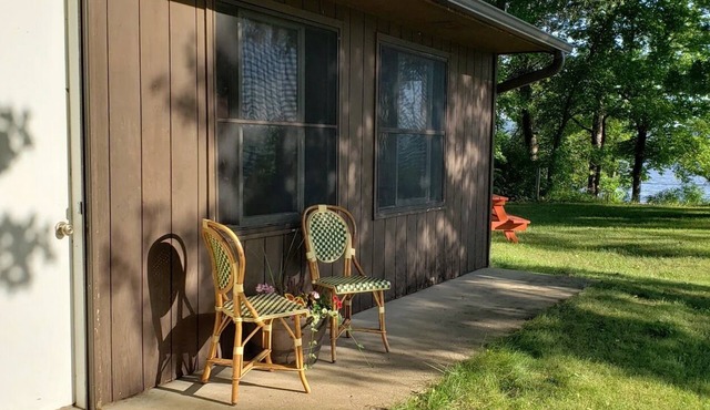 Wake up to views of Lake Pepin & enjoy beachfront access + waterfront amenities