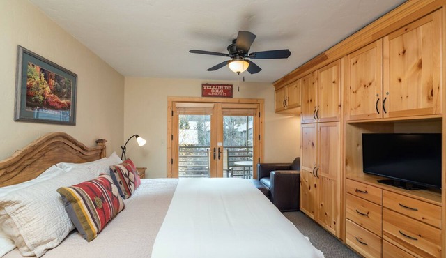 Walk to All! Riverside Balcony with Ski Mountain Views and pool + hot tub