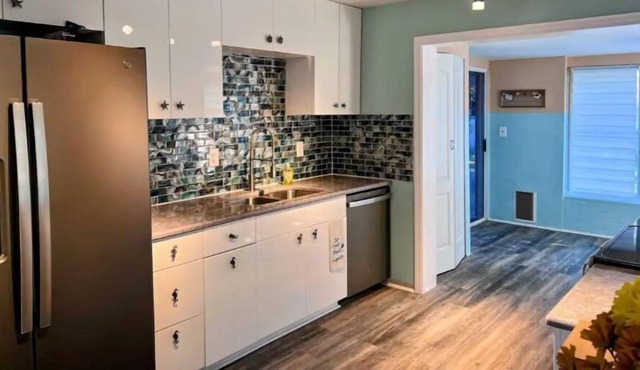 Walk to Beach Cottage with a Lemon tree.