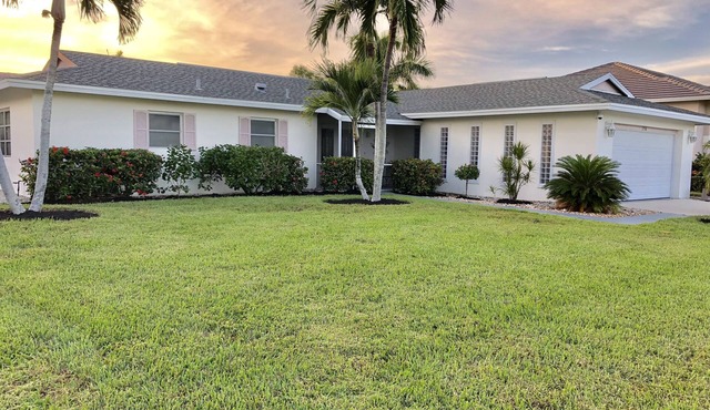 Walk to Marco's beautiful white sand beach or lounge by your private pool.