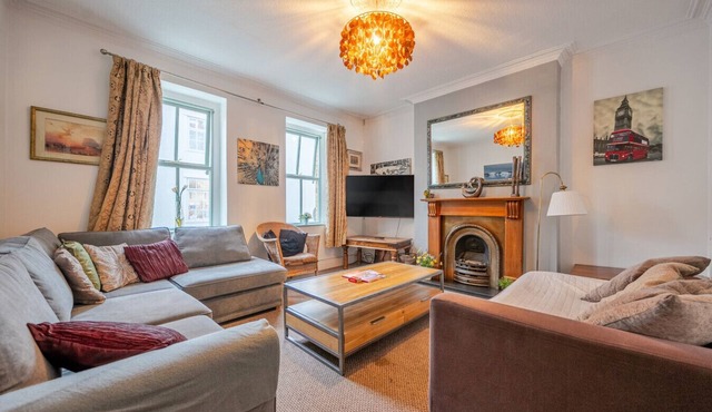 Walk to shops, station and stadium, with fireplace