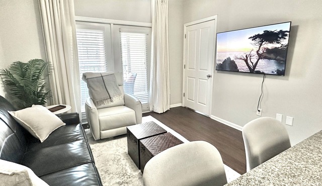 Walk to Stadium & Cotton District 2 Parking Spots + Balcony & Pool