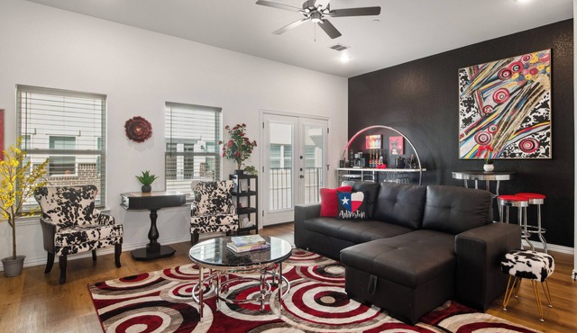 Walk to the Arlington Grand Prix from the new Luxurious Condo w/Premium Amenities! Rooftop Retreat w views of stadiums, private garage & gated entry. Book Now to stay at the New Ruby Lux Skyline Retreat!