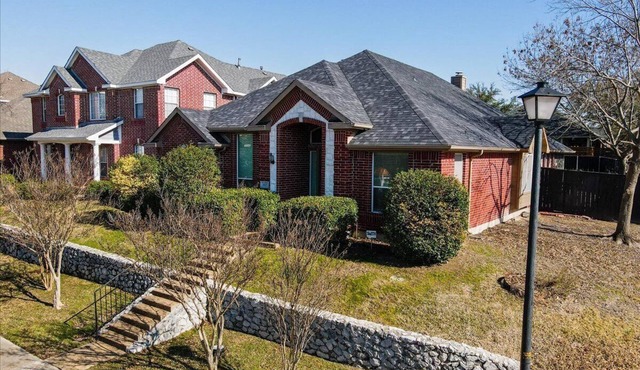 Walk to the Rockwall Harbor from this 3-bedroom 2 bath 1 Story private home.