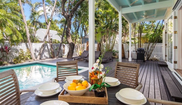 WALKING ON SUNSHINE ~ Exquisite 3 BR, 3 Ba Home w/Heated Pool & Parking!