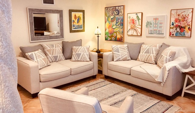 Walking to the beach, the Garden Apartment is set in a tropical garden