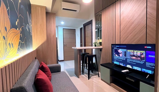 Warm And Homey 2Br At Vida View Makassar Apartment