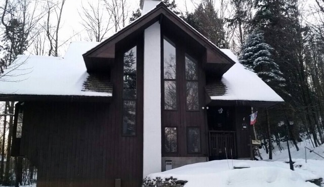 Warm & inviting 4-bedroom home, open floor plan just steps to Okemo Mtn Resort