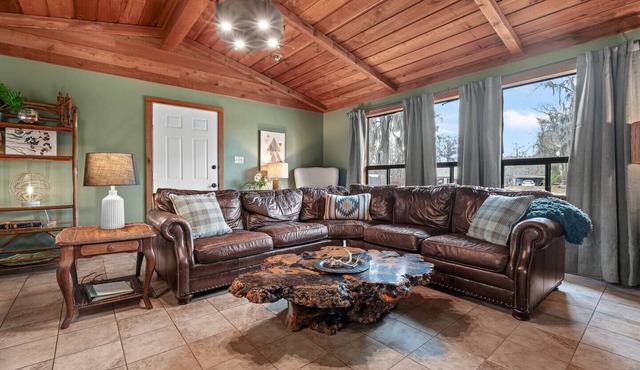 Warm, Rustic Lodge with private dock access steps away, featuring a firepit & picnic table for outdoor dining