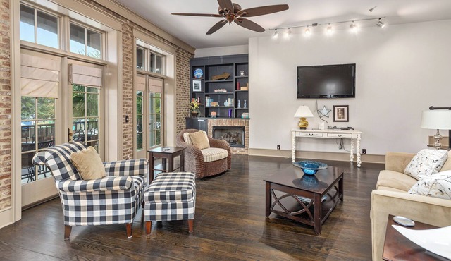 Watch all the goings on in the village from your deck overlooking Mallery St.