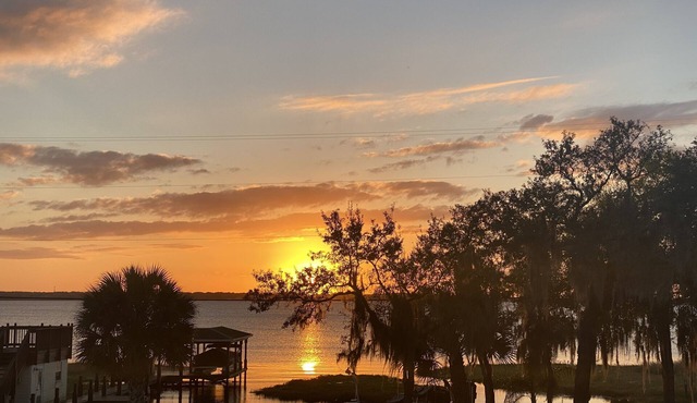 Watch Florida sunsets from the covered lakefront dock