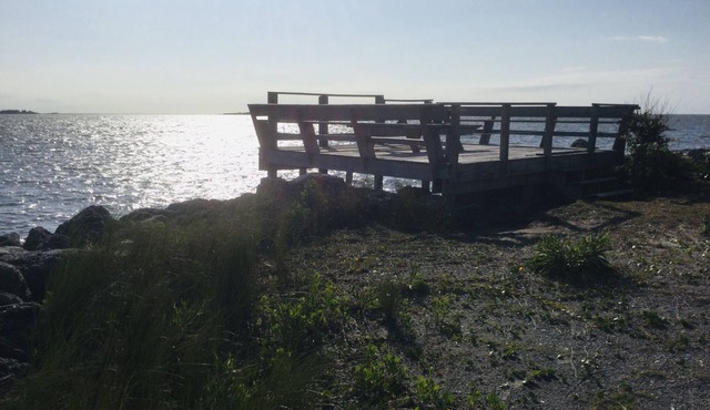 Watch the sun rise from this waterfront home.