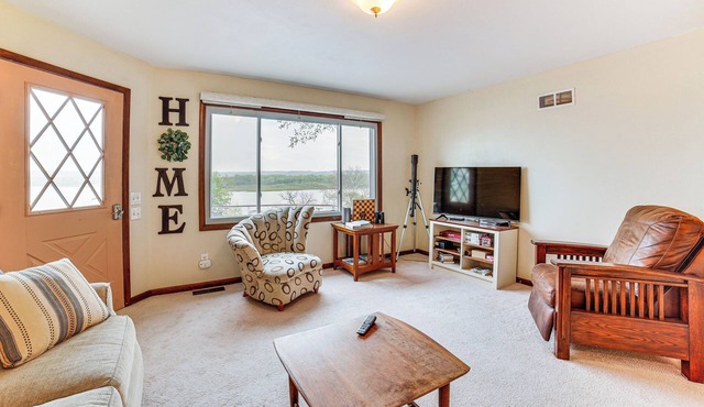 Watch the Sunrise at this Quaint Lake-View Cottage