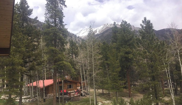 Water front, Log Cabin, Mountain Views, ATV Trails, hiking, fishing, creek front