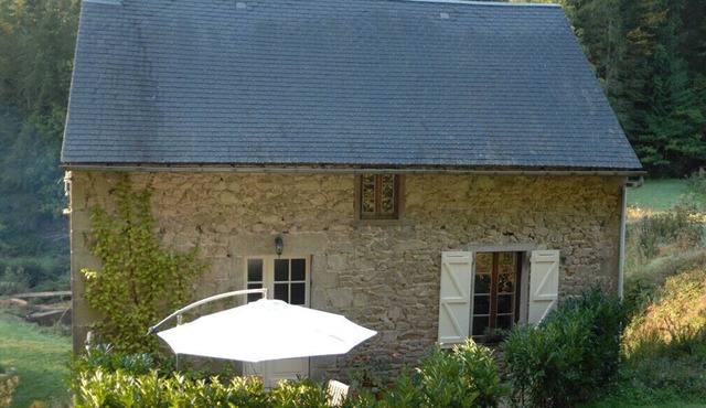 Water Mill set in a private valley with outdoor communal pool.