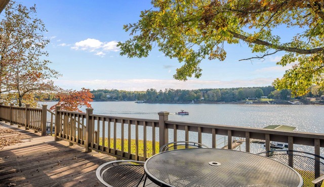 "WATER'S EDGE" - Main Channel views, flat lot, boat slip and PWC port!