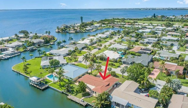 Water's Edge Retreat: 3B/2B Canal Front Home with Private Dock