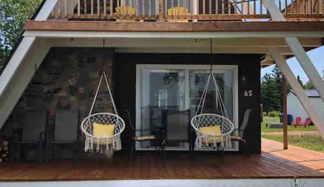 Water view cottage with hot tub, beach access and fire pit