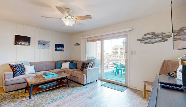 Water-view townhouse with boat slip, shared pools, near beaches