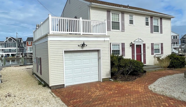 Water Views Everywhere & All Around! Watch the boats cruise by! Normandy Beach