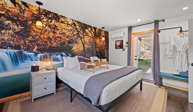 Waterfall Retreat | Serene Room with Forest Mural at Green Acres Retreat