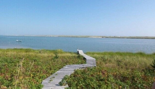 Waterfront 4 bedroom, 3 bath home. Spectacular 180 degree view of Katama Bay