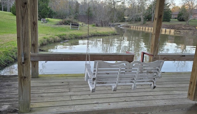 Waterfront 4-bedroom estate with Indoor Pool and covered fishing dock Fire Pit